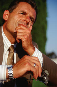 Man Thinking about condo hotels